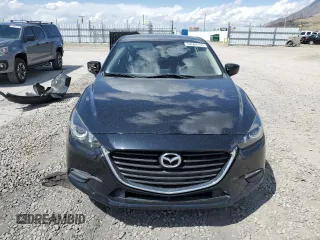 2017 Mazda 3 Touring z VIN 3MZBN1V79HM124716, wystawiony jako Copart lot #54564155 z przebiegiem 80 625 mil mil oraz Szkoda całkowita • Salvage title. Historia ofert i sprzedaży dostępna na DreamBid. Obrazek 5.