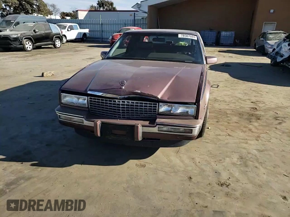 1988 Cadillac Eldorado with VIN 1G6EL1153JU632470, listed as a Copart auction lot 78507684 with 176,894 mi miles and Salvage Title. Bid and sale history available at DreamBid. Image 10.