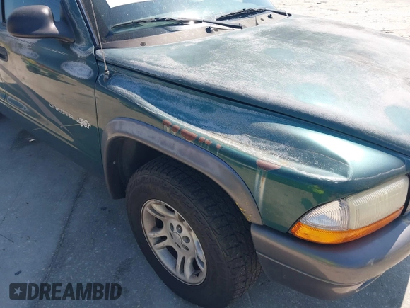2002 Dodge Dakota with VIN 1B7GL12X32S619222, listed as a IAAI auction lot 41793106 with 97,649 mi miles and . Bid and sale history available at carsss.com. Image 6.