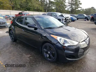 2012 Hyundai Veloster w/Red Int with VIN KMHTC6ADXCU063897, listed as a Copart auction lot 82100474 with 191,493 mi miles and Salvage title. Bid and sale history available at DreamBid. Image 4.