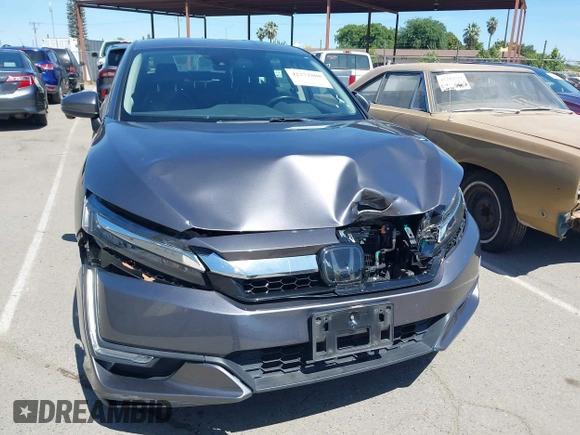 2018 Honda Clarity Touring z VIN JHMZC5F33JC021811, wystawiony jako IAAI lot #42272808 z przebiegiem 82 414 mil mil oraz . Historia ofert i sprzedaży dostępna na DreamBid. Obrazek 12.