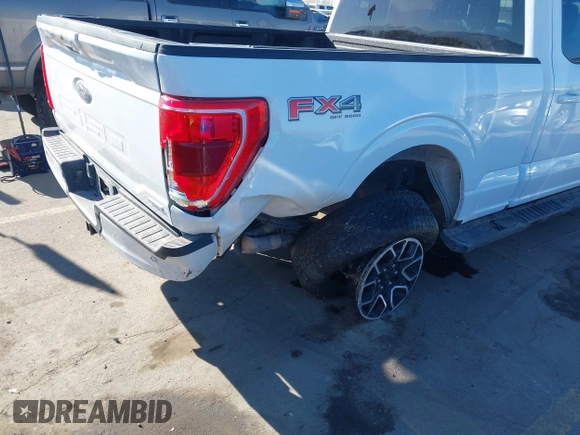 2023 Ford F-150 XL with VIN 1FTFW1E87PFB31057, listed as a IAAI auction lot 41388451 with 28,233 mi miles. Bid and sale history available at carsss.com. Image 6.