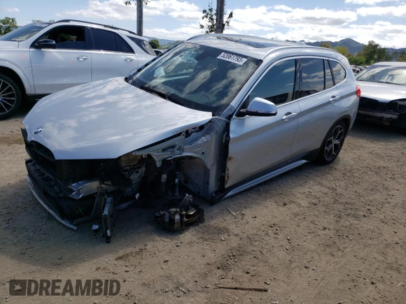 2018 BMW X1 sDrive28i with VIN WBXHU7C38J3H42948, listed as a Copart auction lot 52061793 with 26,991 mi miles and . Bid and sale history available at DreamBid. Image 1.