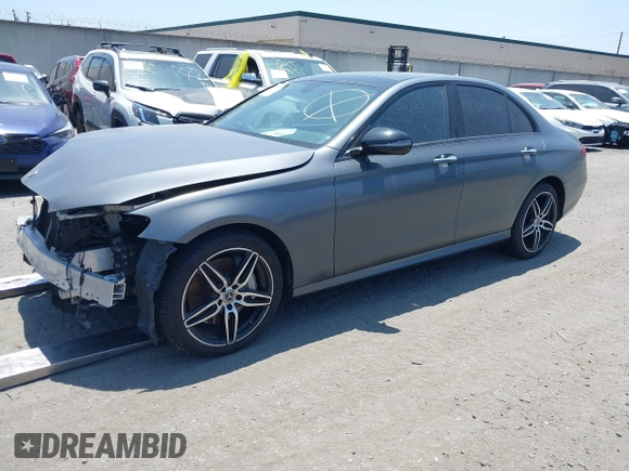 2019 Mercedes-Benz E 300 with VIN WDDZF4JB3KA601824, listed as a IAAI auction lot 42053608 with 54,998 mi miles and . Bid and sale history available at DreamBid. Image 2.