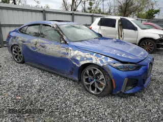 2024 BMW i4 M50 z VIN WBY33AW00RFS45178, wystawiony jako Copart lot #46379085 z przebiegiem Nie podano mil oraz Nie do naprawy • Non repairable. Historia ofert i sprzedaży dostępna na DreamBid. Obrazek 4.