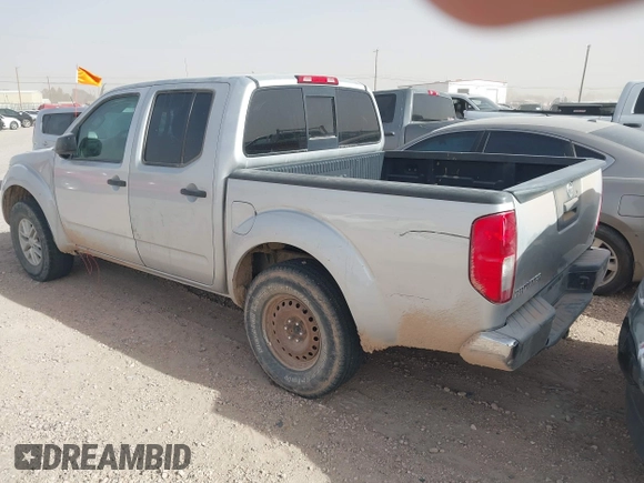 2014 Nissan Frontier SV with VIN 1N6AD0ER0EN759772, listed as a IAAI auction lot 41479252 with 153,630 mi miles and . Bid and sale history available at DreamBid. Image 3.