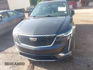 2020 Cadillac XT6 FWD Premium Luxury with VIN 1GYKPCRS0LZ206567, listed as a IAAI auction lot 42254511 with 80,443 mi miles and . Bid and sale history available at DreamBid. Image 13.