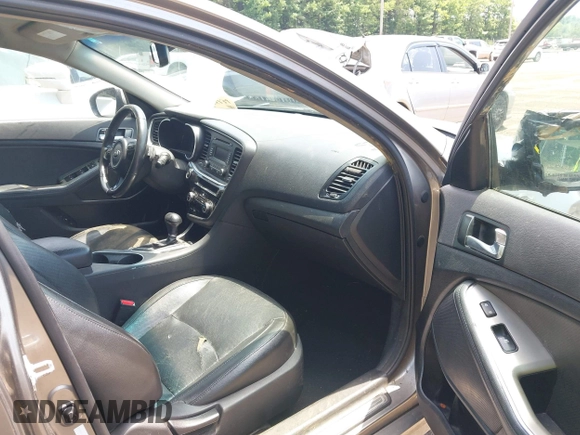 2014 Kia Optima SX with VIN 5XXGR4A75EG270693, listed as a IAAI auction lot 42606134 with 126,486 mi miles and . Bid and sale history available at DreamBid. Image 5.