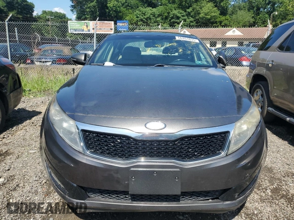 2013 Kia Optima EX с VIN 5XXGN4A72DG180637, выставлен на аукционе Copart как лот 66261835 с пробегом Не указан миль и Списание • Salvage title. История ставок и продаж доступна на DreamBid. Изображение 5.