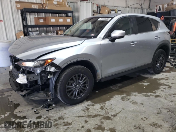 2021 Mazda CX-5 Touring with VIN JM3KFBCM7M0467530, listed as a Copart auction lot 42238385 with 33,277 mi miles and Salvage Title. Bid and sale history available at carsss.com. Image 1.