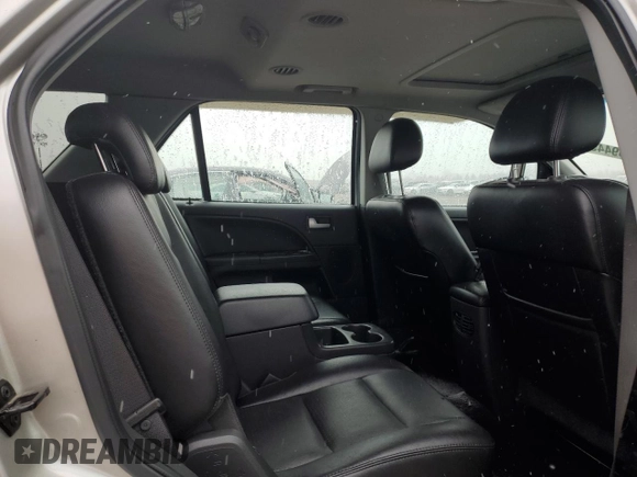 2006 Ford Freestyle Limited z VIN 1FMZK06126GA49956, wystawiony jako Copart lot #47589445 z przebiegiem 165 185 mil mil oraz Szkody całkowita. Historia ofert i sprzedaży dostępna na DreamBid. Obrazek 12.