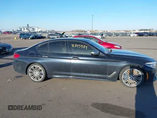 2018 BMW 5 Series M550i xDrive with VIN WBAJB9C59JG463948, listed as a IAAI auction lot 41845989 with 99,385 mi miles. Bid and sale history available at carsss.com. Image 13.