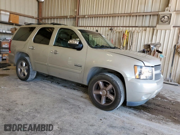 2014 Chevrolet Tahoe LT with VIN 1GNSCBE04ER108507, listed as a Copart auction lot 60931255 with 167,098 mi miles and Salvage title. Bid and sale history available at DreamBid. Image 4.