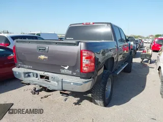 2010 Chevrolet Silverado 1500 LT with VIN 3GCRCSE06AG197630, listed as a IAAI auction lot 41826507 with 135,903 mi miles and . Bid and sale history available at DreamBid. Image 4.