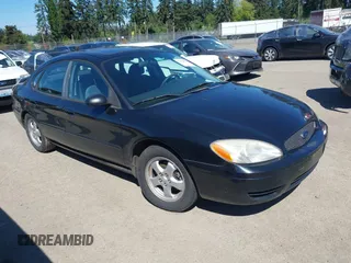 2005 Ford Taurus SE with VIN 1FAFP53255A228082, listed as a IAAI auction lot 42183671 with 95,382 mi miles and . Bid and sale history available at DreamBid. Image 1.