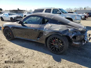 2006 Porsche Cayman S с VIN WP0AB29866U782423, выставлен на аукционе Copart как лот 87725325 с пробегом 51 686 миль миль и Списание • Salvage title. История ставок и продаж доступна на DreamBid. Изображение 2.