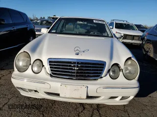 2002 Mercedes-Benz E-Class with VIN WDBJF82JX2X072551, listed as a Copart auction lot 83607634 with 139,645 mi miles and Salvage Title. Bid and sale history available at carsss.com. Image 5.