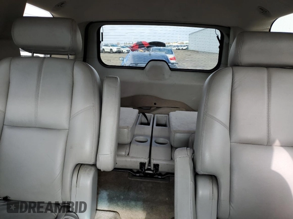 2007 GMC Yukon SLT with VIN 1GKFK130X7R106388, listed as a Copart auction lot 86125434 with 144,528 mi miles and Salvage Title. Bid and sale history available at carsss.com. Image 10.