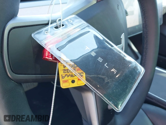 2022 Tesla Model 3 Long Range z VIN 5YJ3E1EB9NF197127, wystawiony jako IAAI lot #41366323 z przebiegiem 56 559 mil mil oraz . Historia ofert i sprzedaży dostępna na DreamBid. Obrazek 11.