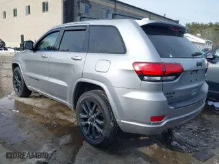 2018 Jeep Grand Cherokee Laredo E with VIN 1C4RJFAG1JC487082, listed as a IAAI auction lot 41663081 with 136,853 mi miles. Bid and sale history available at carsss.com. Image 3.