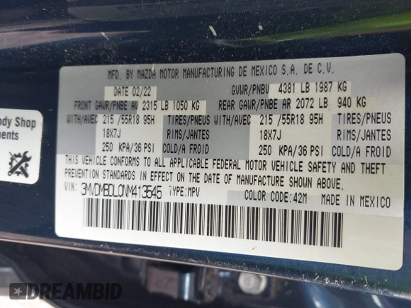 2022 Mazda CX-30 S Premium with VIN 3MVDMBDL0NM413545, listed as a IAAI auction lot 42493594 with 57,013 mi miles and . Bid and sale history available at DreamBid. Image 9.