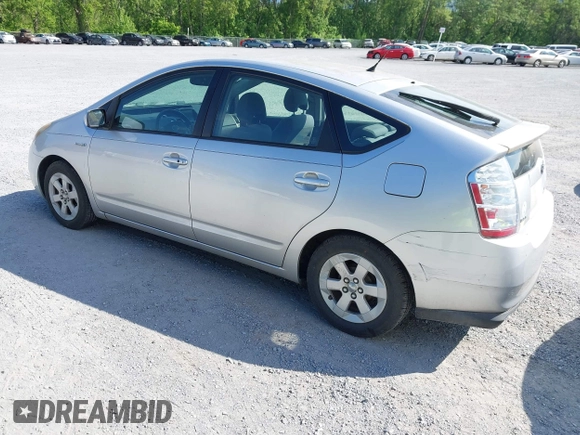 2007 Toyota Prius with VIN JTDKB20U777634652, listed as a IAAI auction lot 42182657 with 200,657 mi miles and . Bid and sale history available at DreamBid. Image 3.