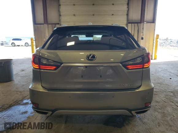 2022 Lexus RX with VIN 2T2HZMDA4NC331708, listed as a Copart auction lot 50336595 with 9,068 mi miles and Salvage Title. Bid and sale history available at carsss.com. Image 6.