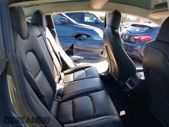 2022 Tesla Model 3 with VIN 5YJ3E1EA8NF241691, listed as a IAAI auction lot 41742584 with 70,375 mi miles and . Bid and sale history available at DreamBid. Image 8.