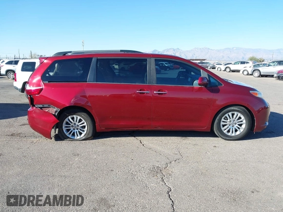 2015 Toyota Sienna XLE with VIN 5TDYK3DCXFS621190, listed as a IAAI auction lot 41646481 with 173,817 mi miles. Bid and sale history available at carsss.com. Image 13.