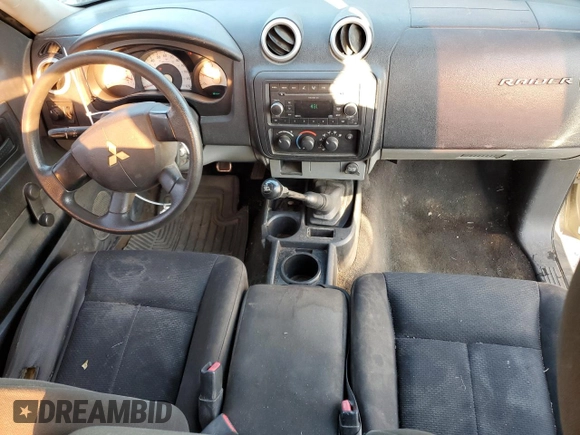 2008 Mitsubishi Raider LS z VIN 1Z7HC22KX8S609878, wystawiony jako Copart lot #85869764 z przebiegiem 163 672 mil mil oraz Szkoda całkowita • Salvage title. Historia ofert i sprzedaży dostępna na DreamBid. Obrazek 8.