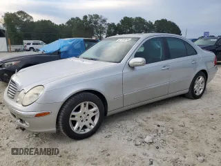 2003 Mercedes-Benz E-Class 3.2L with VIN WDBUF65J93A087012, listed as a Copart auction lot 67157614 with 146,985 mi miles and Salvage Title. Bid and sale history available at carsss.com. Image 1.