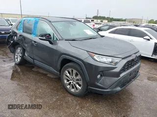 2021 Toyota RAV4 XLE Premium with VIN 2T3C1RFV9MW147985, listed as a IAAI auction lot 42486318 with 29,494 mi miles and . Bid and sale history available at DreamBid. Image 1.