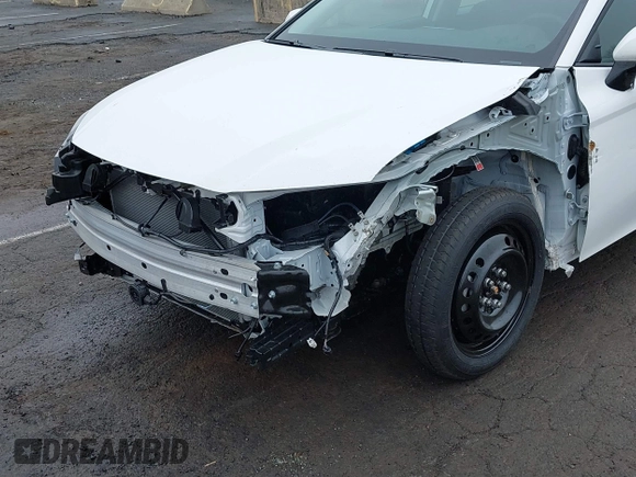 2025 Toyota Camry LE with VIN 4T1DAACK1SU504839, listed as a IAAI auction lot 41845964 with 11,934 mi miles and . Bid and sale history available at DreamBid. Image 6.