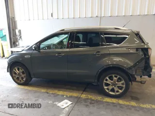 2016 Ford Escape Titanium with VIN 1FMCU9J92GUB63525, listed as a IAAI auction lot 41469824 with 156,773 mi miles. Bid and sale history available at carsss.com. Image 14.
