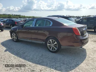 2009 Lincoln MKS with VIN 1LNHM93R19G631250, listed as a Copart auction lot 55442505 with 160,926 mi miles and Salvage Title. Bid and sale history available at DreamBid. Image 2.