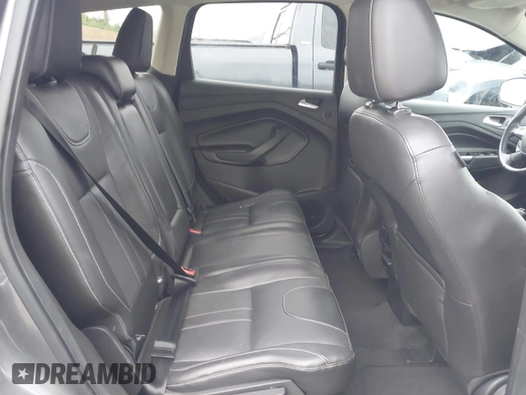 2013 Ford Escape Titanium with VIN 1FMCU0J95DUC71130, listed as a IAAI auction lot 42072032 with 144,054 mi miles and . Bid and sale history available at carsss.com. Image 8.