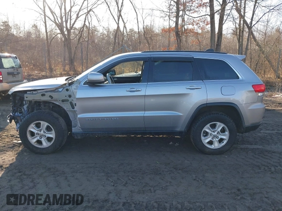 2015 Jeep Grand Cherokee Laredo with VIN 1C4RJFAG9FC775004, listed as a IAAI auction lot 41754534 with 116,893 mi miles. Bid and sale history available at carsss.com. Image 14.