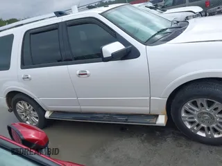2011 Ford Expedition Limited with VIN 1FMJU1K56BEF19871, listed as a IAAI auction lot 41612117 with 246,367 mi miles. Bid and sale history available at carsss.com. Image 13.