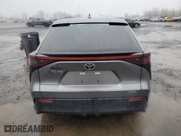 2023 Toyota bZ4X XLE with VIN JTMABACA8PA040484, listed as a Copart auction lot 51410705 with 9,807 mi miles and Salvage Title. Bid and sale history available at DreamBid. Image 6.