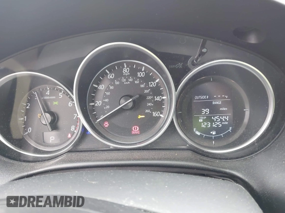 2016 Mazda CX-5 Touring with VIN JM3KE4CY2G0894930, listed as a IAAI auction lot 41906809 with 123,125 mi miles. Bid and sale history available at carsss.com. Image 7.