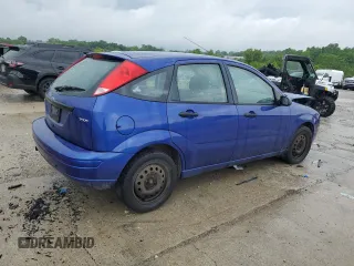 2005 Ford Focus S with VIN 3FAFP37N35R156460, listed as a Copart auction lot 58781635 with 231,066 mi miles and Salvage title. Bid and sale history available at DreamBid. Image 3.