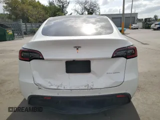 2020 Tesla Model Y Long Range z VIN 5YJYGDEE2LF049815, wystawiony jako Copart lot #53738165 z przebiegiem 113 779 mil mil oraz Szkoda całkowita • Salvage title. Historia ofert i sprzedaży dostępna na DreamBid. Obrazek 6.