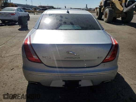 2014 Jaguar XJ Portfolio with VIN SAJWA2GZ2E8V70065, listed as a Copart auction lot 43872505 with 138,677 mi miles and Salvage title. Bid and sale history available at DreamBid. Image 6.