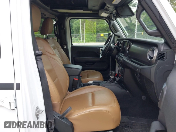 2021 Jeep Wrangler Unlimited Rubicon with VIN 1C4JJXFM9MW774142, listed as a IAAI auction lot 42625007 with 42,318 mi miles and . Bid and sale history available at DreamBid. Image 5.