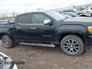 2021 GMC Canyon 4WD Denali with VIN 1GTG6EEN6M1260580, listed as a IAAI auction lot 41918693 with 52,085 mi miles. Bid and sale history available at carsss.com. Image 13.