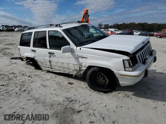 1995 Jeep Grand Cherokee Limited with VIN 1J4GZ78Y2SC788413, listed as a Copart auction lot 80297444 with 309,566 mi miles and Salvage Title. Bid and sale history available at carsss.com. Image 4.