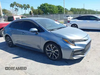 2021 Toyota Corolla SE with VIN JTDS4MCE1MJ063524, listed as a IAAI auction lot 41822622 with 50,882 mi miles. Bid and sale history available at carsss.com. Image 1.