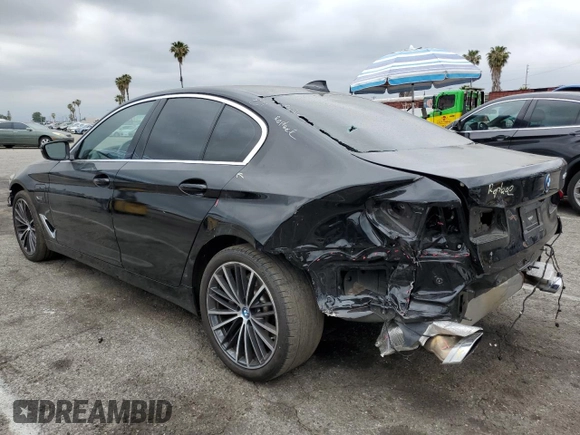 2023 BMW 5 Series 530e with VIN WBA13AG01PCM24624, listed as a Copart auction lot 55149855 with 26,022 mi miles and Salvage title. Bid and sale history available at DreamBid. Image 2.