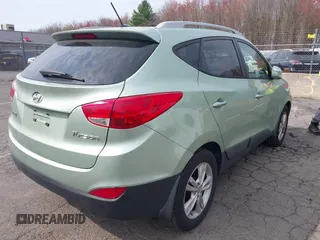 2013 Hyundai Tucson GLS with VIN KM8JU3AC7DU580229, listed as a IAAI auction lot 42127349 with 204,975 mi miles. Bid and sale history available at carsss.com. Image 4.