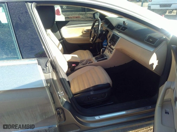 2013 Volkswagen CC Sport with VIN WVWBN7AN1DE563404, listed as a IAAI auction lot 41659845 with 171,631 mi miles. Bid and sale history available at carsss.com. Image 5.